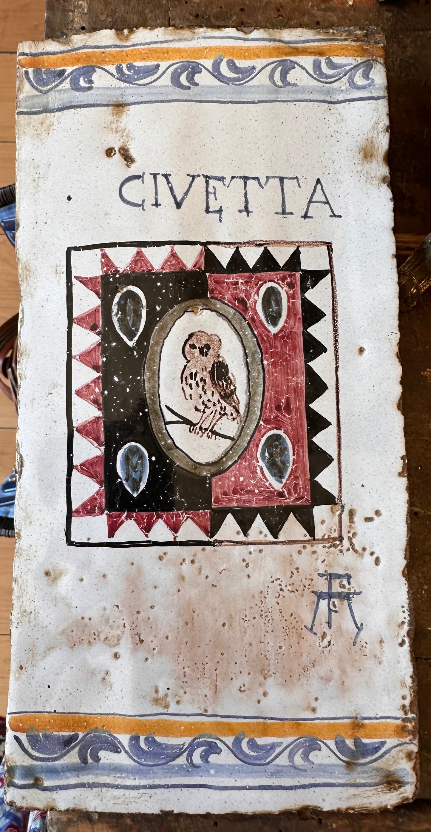 Piastrella in terracotta dipinta a mano